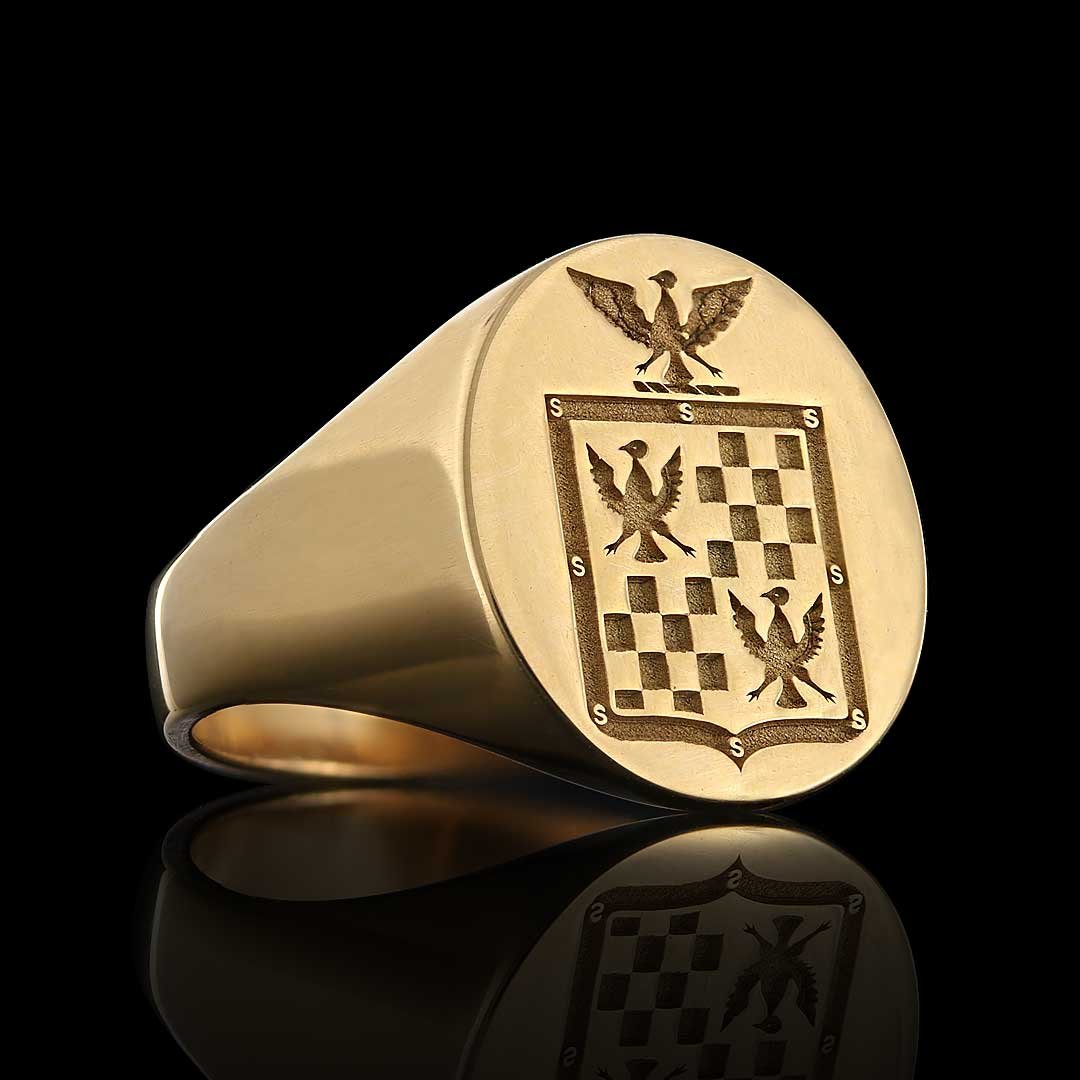 Gold crest signet ring